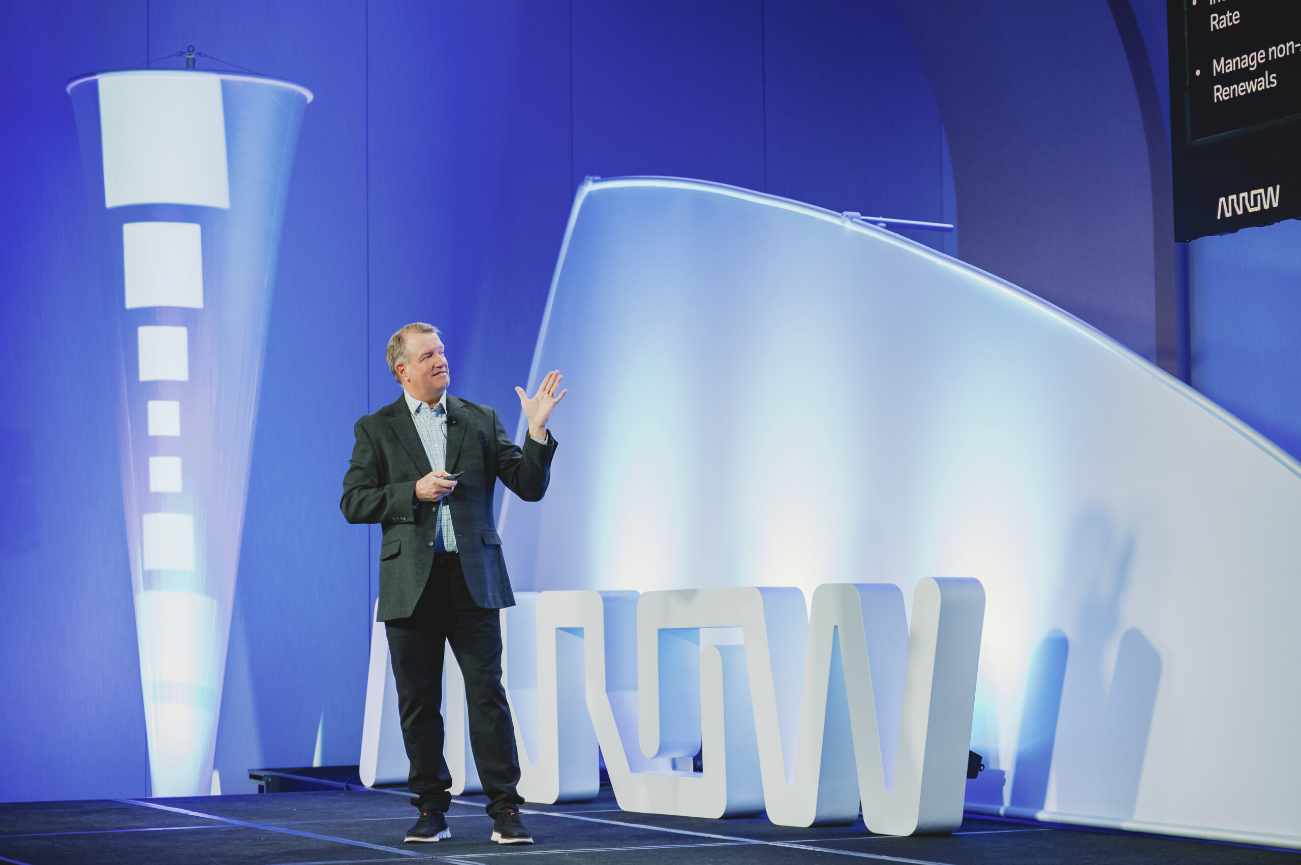 Arrow Electronics keynote speaker on stage at ACT conference photographed by From the Hip Photo