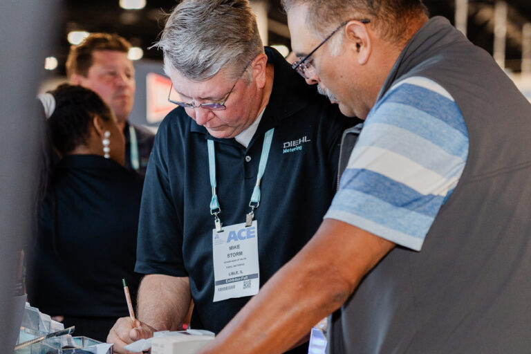 Event planner coordinating conference photography