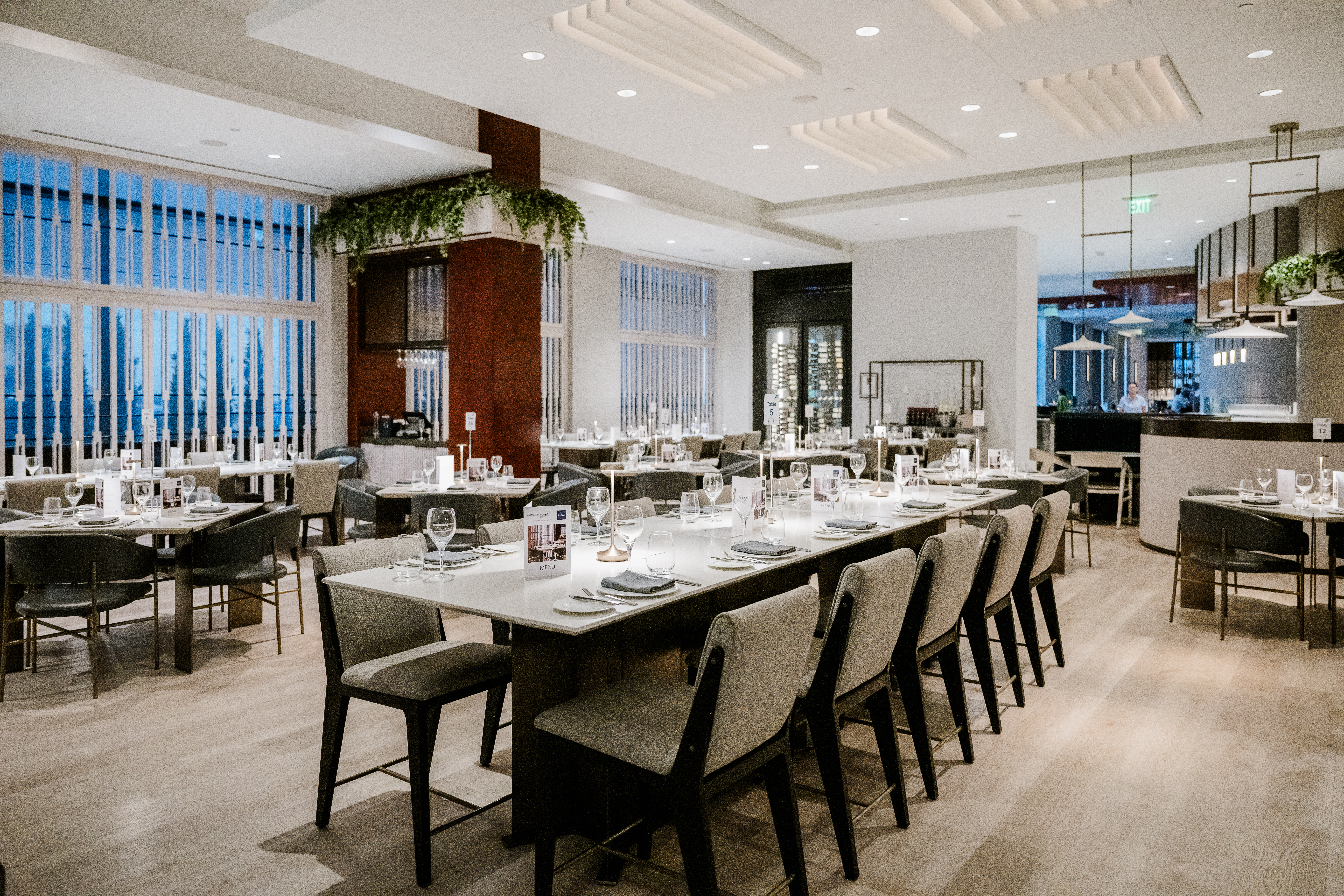 Conference attendees networking at Denver corporate event by From the Hip Photo