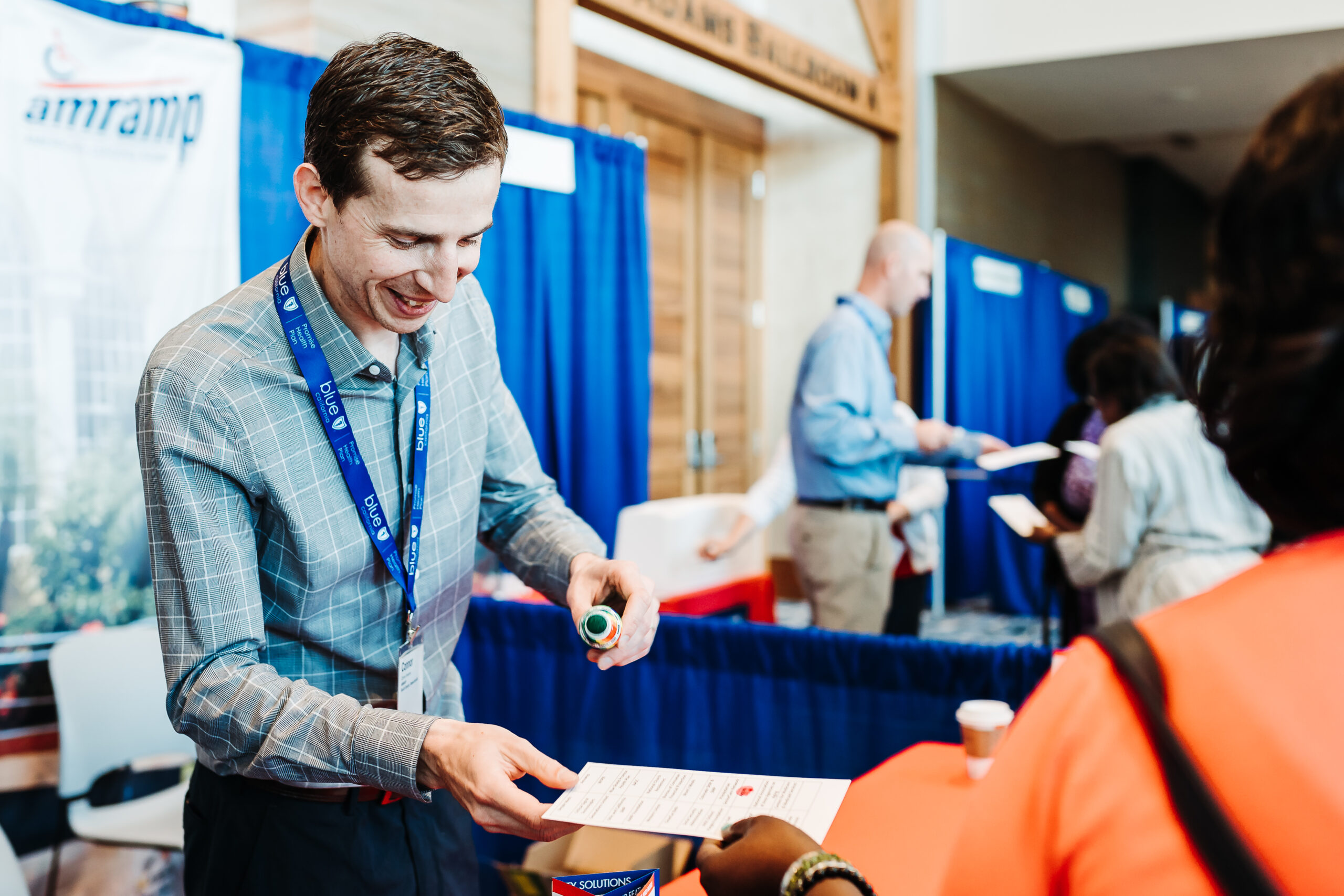 Corporate event photography at Colorado convention venue by From the Hip Photo