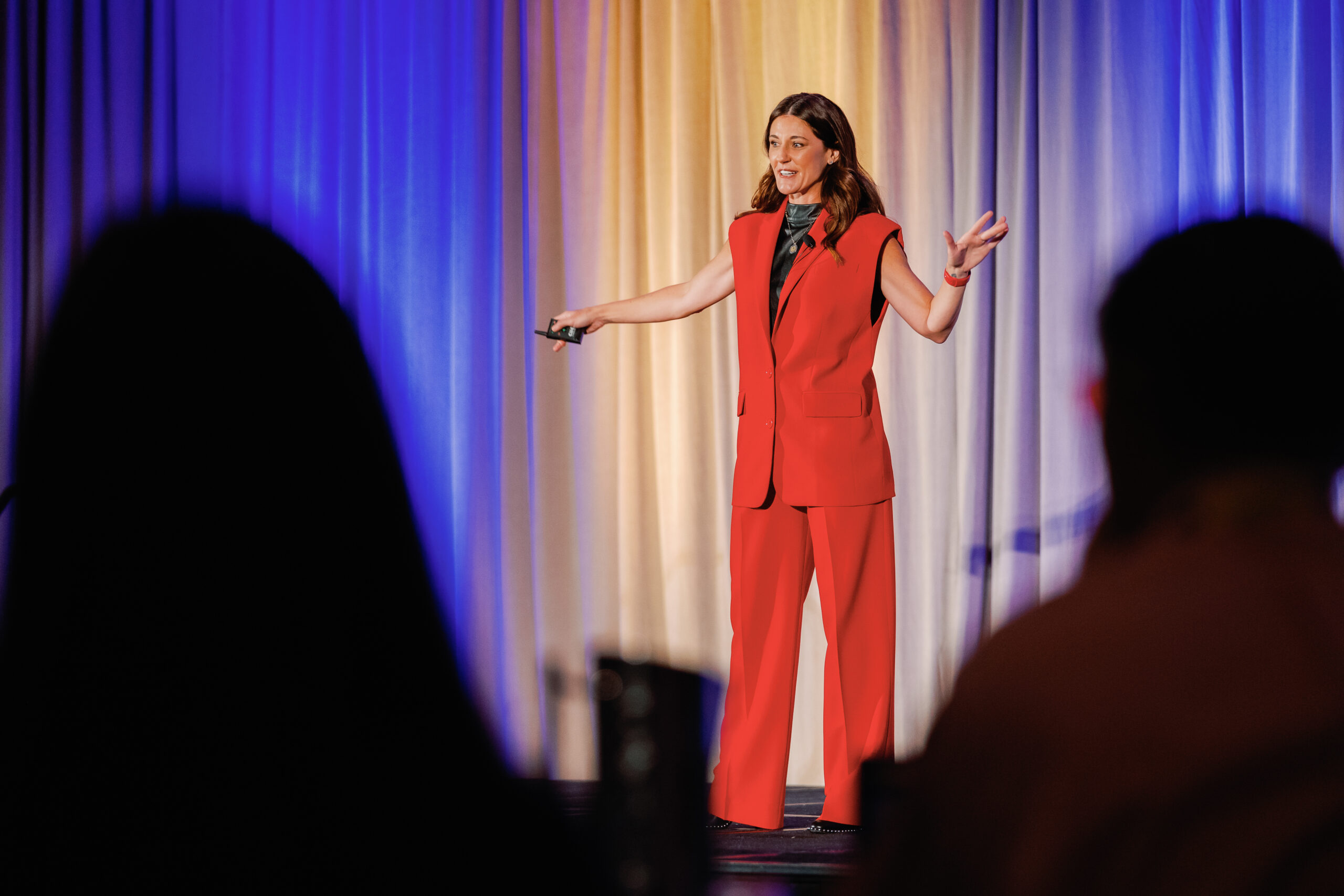 Conference attendees networking at Denver corporate event by From the Hip Photo