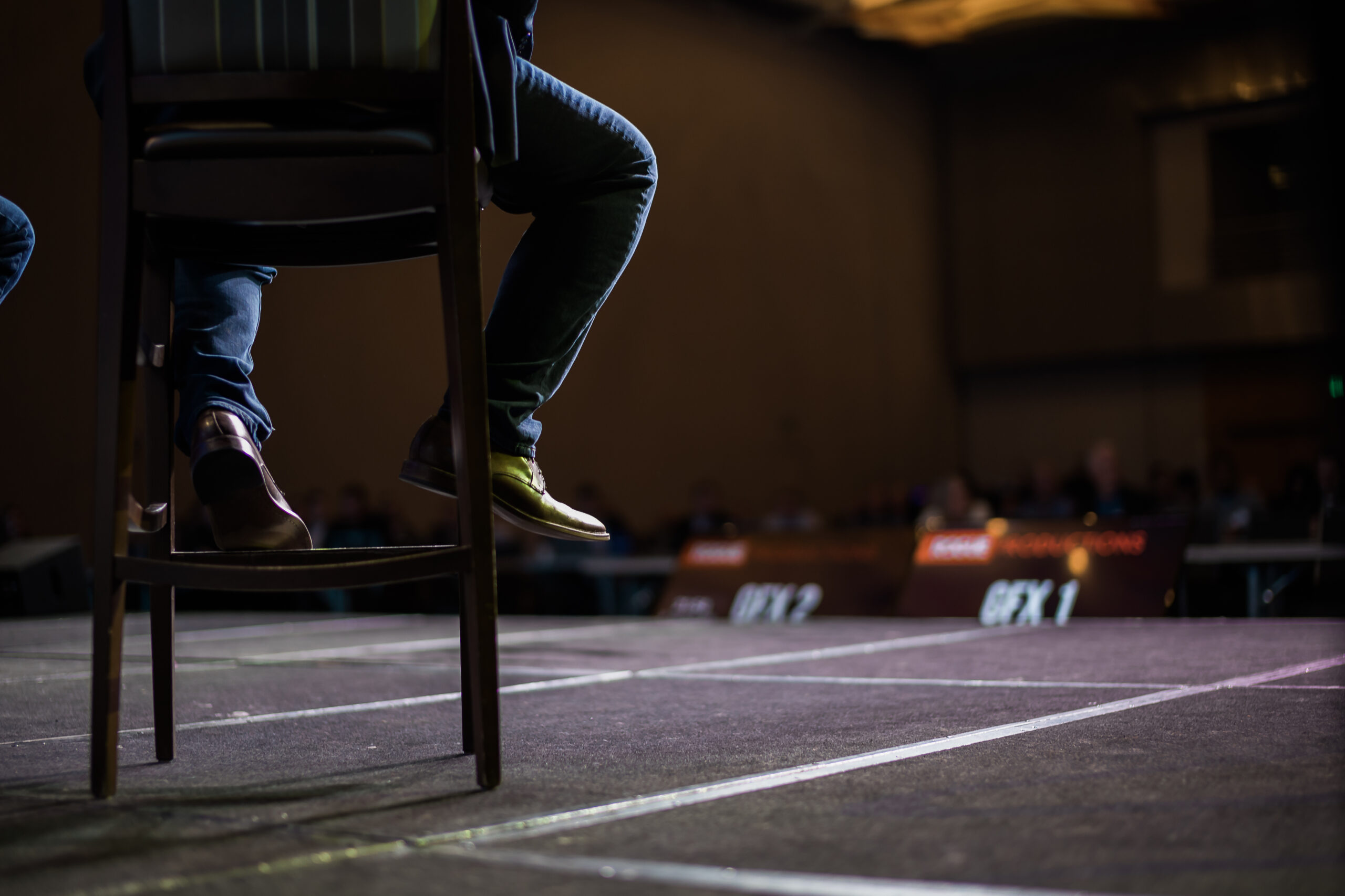 Professional conference photography capturing keynote presentation in Denver