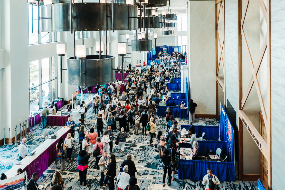 Conference event photography in action at Denver venue by From the Hip Photo