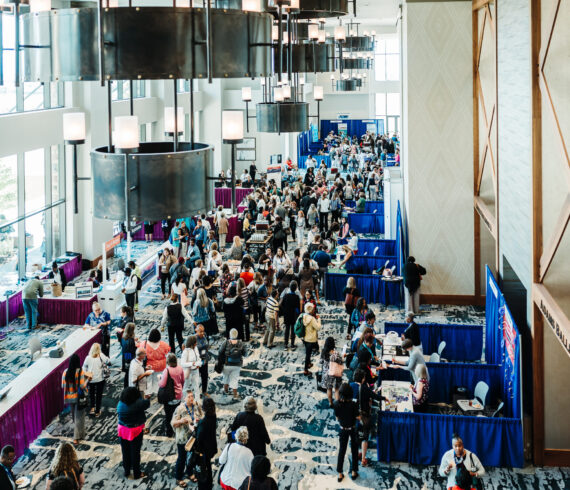 Conference event photography in action at Denver venue by From the Hip Photo