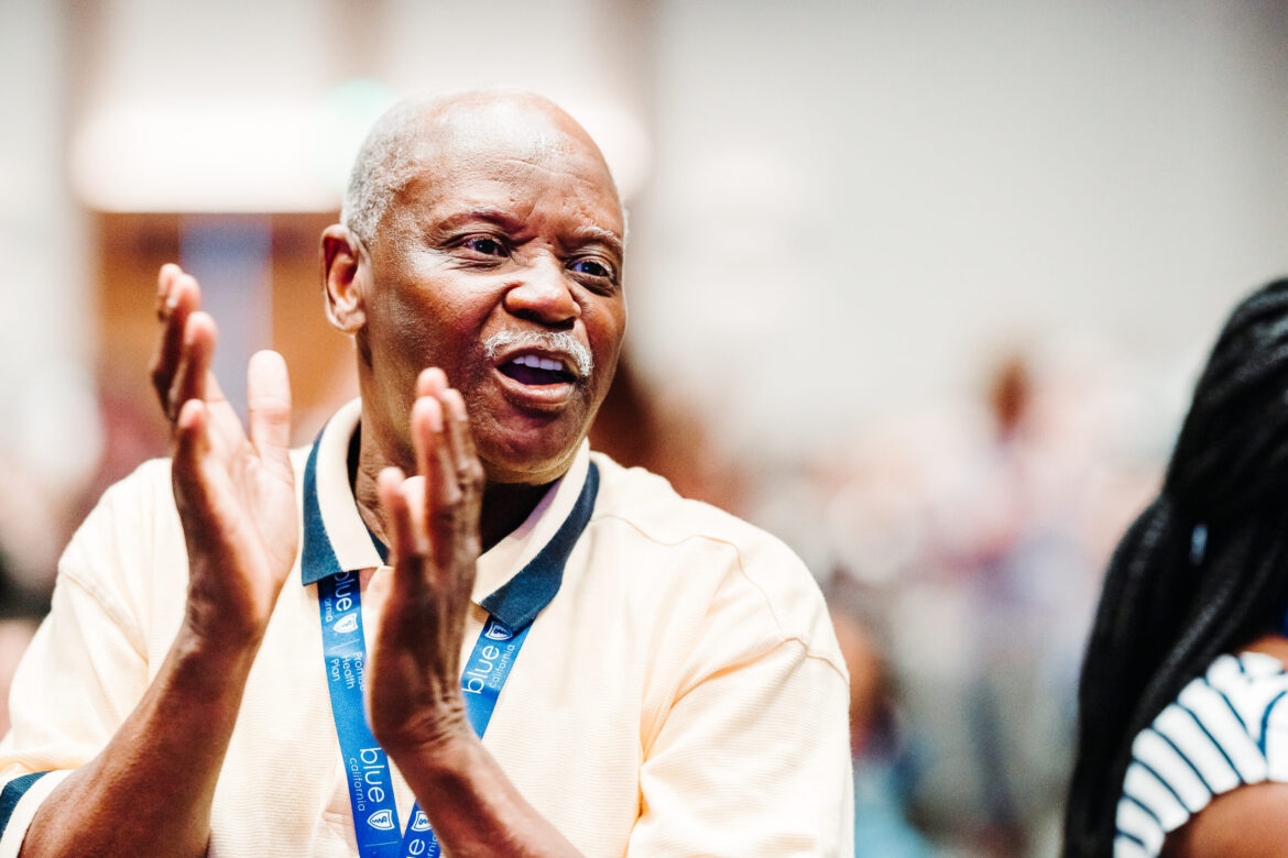 Conference session photography showing engaged attendees at corporate event