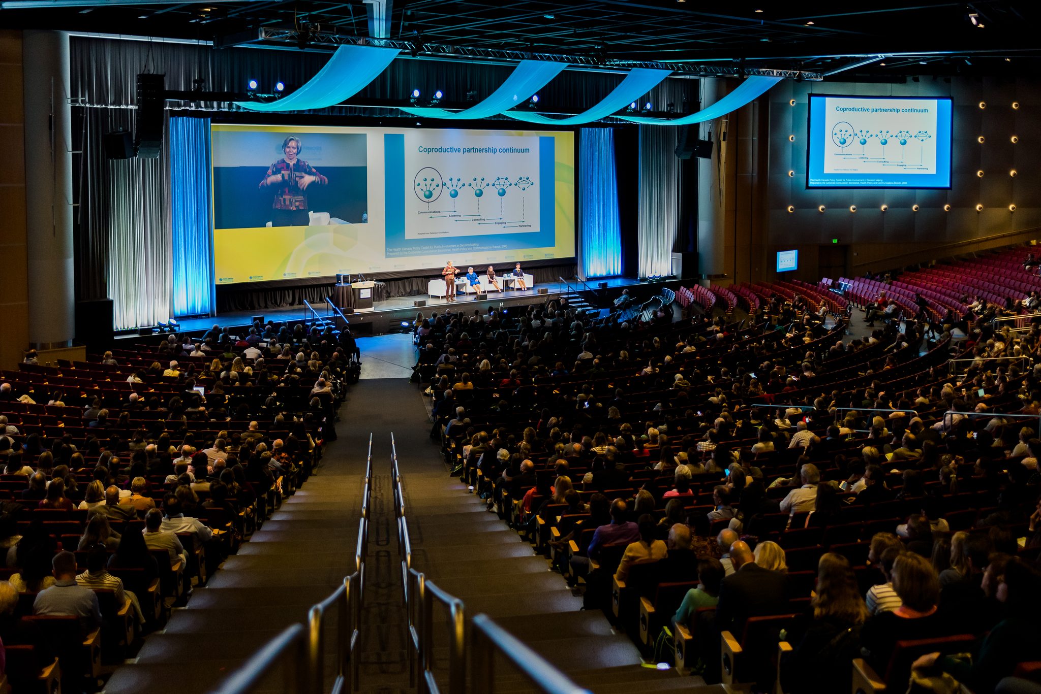 Keynote speaker photography at the Colorado Convention Center by From the Hip Photo