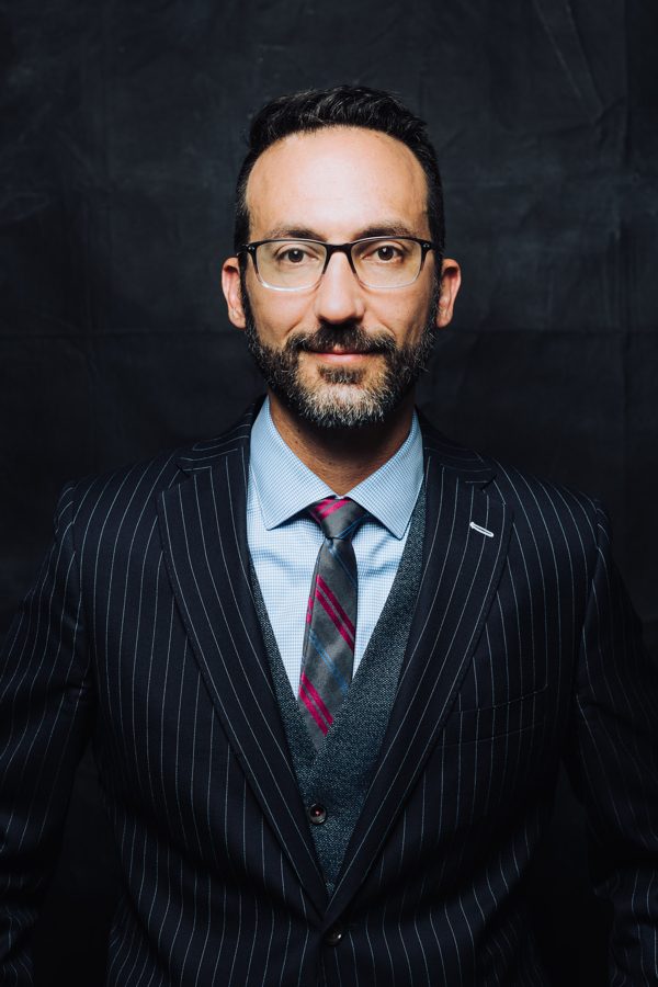 Professional conference headshot - woman in black blazer by From the Hip Photo